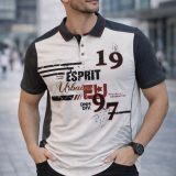 Model wearing Men’s Urban Graphic Polo Shirt in stylish street background with modern printed design and contrast sleeves.